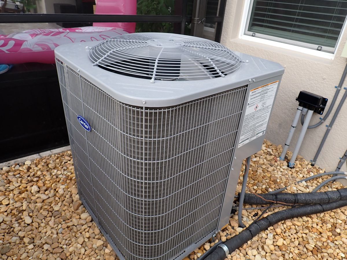 A/C condenser documented during a Florida 4-point inspection